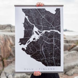 Oulu-juliste puukiinnikkeissä